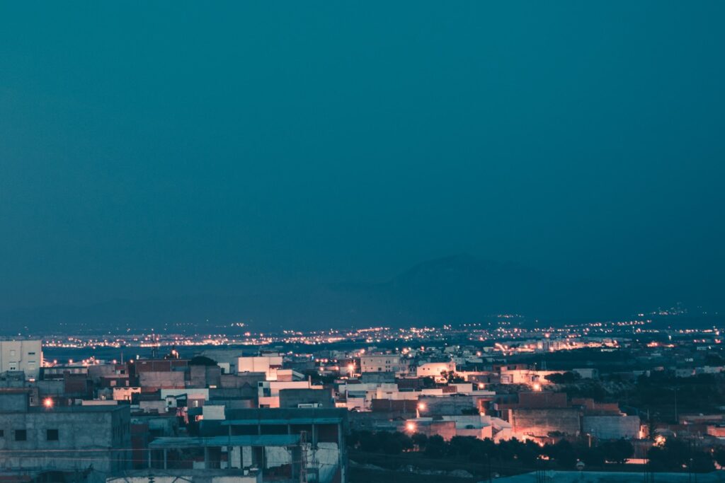 city skyline during night time